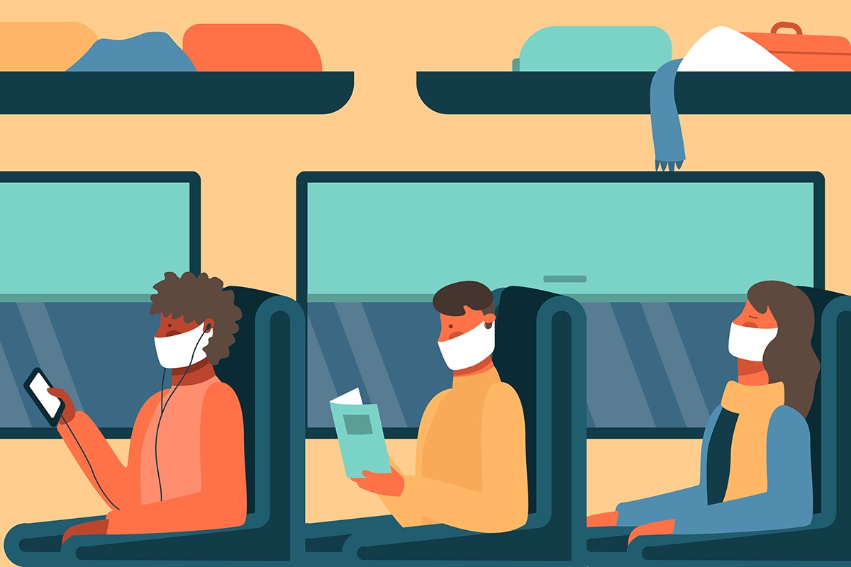 ludzie w maskach w pociągu